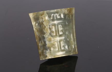A Chinese Celadon Jade Sword Chape
