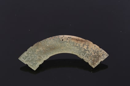 A Chinese Celadon Jade Huang Pendant
