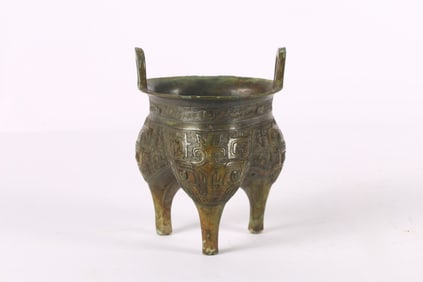 A Chinese Bronze 'Taotie' Food Vessel, Liding