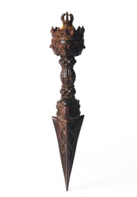A Tibetan Gilt Polychrome Ebony Carved Phurba