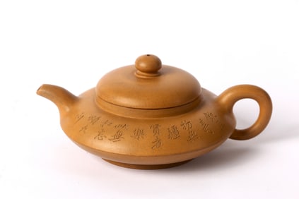 A Yixing Inscribed 'Plum Blossoms' Teapot