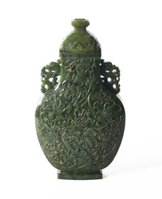 A Large Green Jade 'Eight Emblems' Vase and Cover