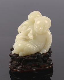 A Chinese White Jade 'Ruyi Boys' Carving Group