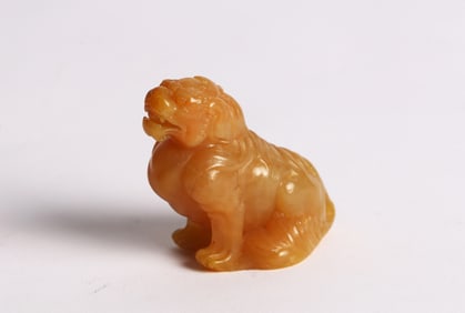 A Fine Tianhuang Carved Seated Lion