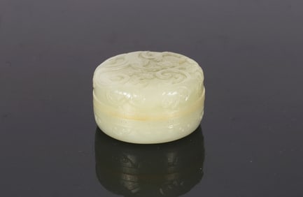 A Chinese White Jade 'Chilong' Circular Box