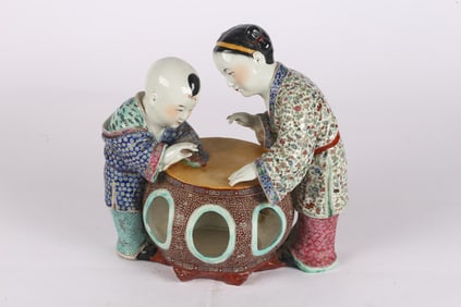A Famille Rose Porcelain of Boy and Girl Sculpture