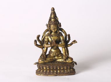 A Gilt Bronze Figure of Eight-Armed Avalokiteshvara