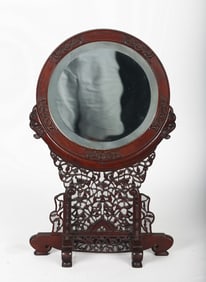 A Chinese Hardwood Circular Mirror