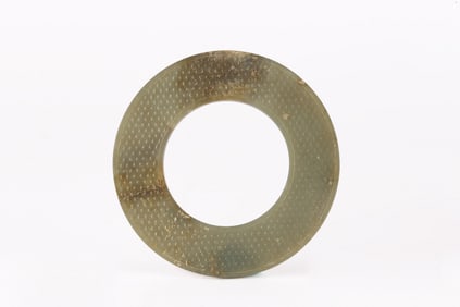 A Chinese Celadon Jade Disc