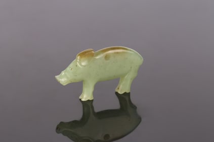 A Chinese Celadon Jade Pig