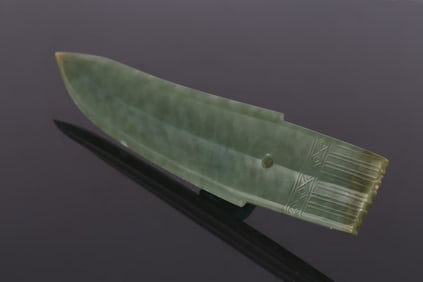 A Chinese Celadon Jade Blade, Ge