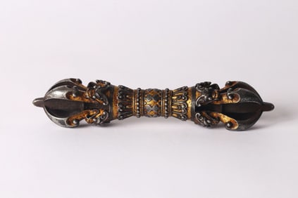 A Tibetan Gold Decorated Iron Vajra