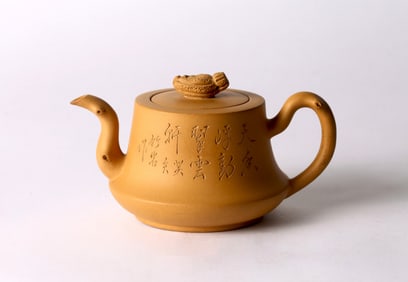 A Yixing 'Duan' Clay Inscribed 'Plum Blossoms' Teapot