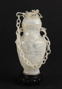 A Very Rare Chinese White Jade 'Mughal' Vase: &#28165;&#20013;&#26399; &#30165;&#37117;&#26031;&#22374;&#30333;&#29577;&#34030;&#33457;'&#22825;&#22899;&#39438;&#40607;'&#37832;&#29942; Delicately worked and very thinly carved in translucent whit
