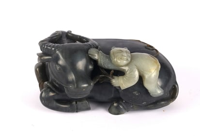A Black and White Jade 'Buffalo and Boy' Carving