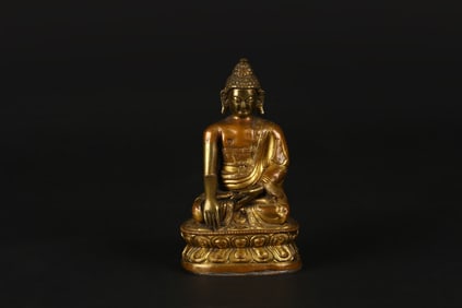 A Gilt Bronze Figure of Shakyamuni