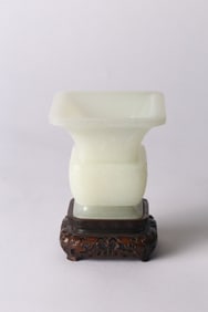 A Chinese White Jade 'Zhadou' Vase and Stand