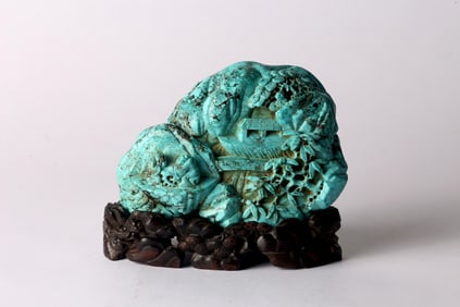 A Chinese Turquoise 'Landscape and Figures' Boulder
