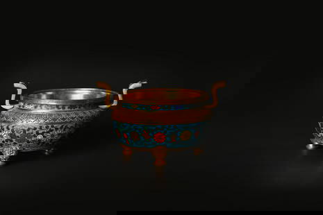 A Chinese Cloisonne Enamel 'Lotus' Tripod Censer: &#28165; &#37509;&#37775;&#37329;&#25488;&#32114;&#29754;&#29807;&#19977;&#36275;&#29200; The compressed body supported on three ruyi-form feet, brightly enamelled with lotus blooms amidst foliate scr