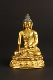 A Gilt Bronze Figure of Shakyamuni