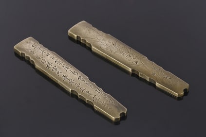 A Pair of Baitong Inscribed 'Guqin' Paperweights