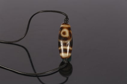 A Tibetan Dzi Bead