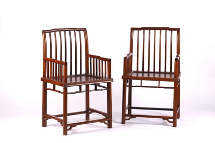 A Pair of Huali Hardwood Spindle Back Armchairs