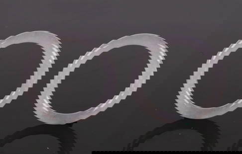 A Pair of Lavender Jadeite Baby Bangles: 紫羅蘭翡翠兒童手環一對 Each of circular form, well-polished with slightly rounded outer and inner walls, the translucent stone of an e