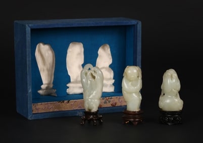 A Group of Three Chinese White Jade Carvings