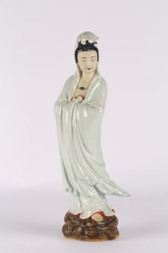 A Chinese White Glazed Guanyin Figure