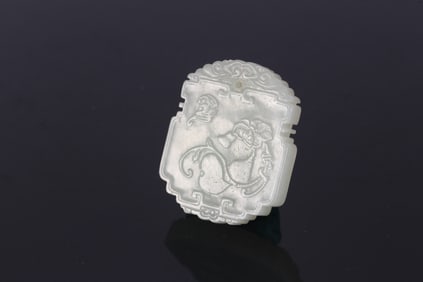 A White Jade 'Auspicious Symbols' Plaque