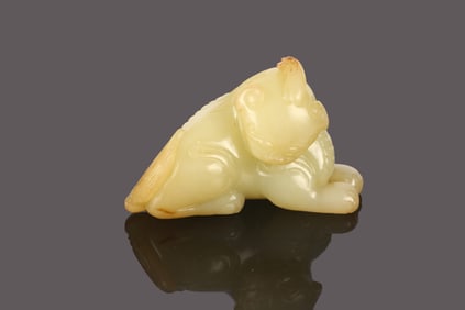 A Chinese White Jade Recumbent Mythical Beast