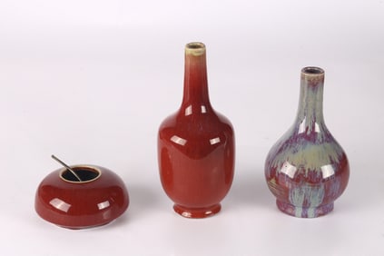 A Set of Three Sang De Boeuf Glazed Vases