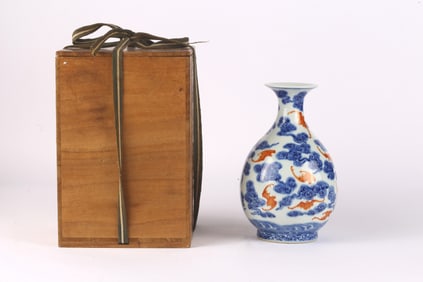 An Iron-red and Underglaze-blue ‘Bats and Clouds’ Vase