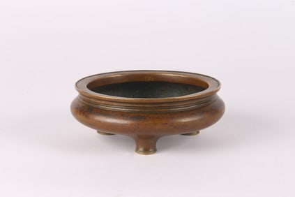 A Chinese Bronze Tripod Censer