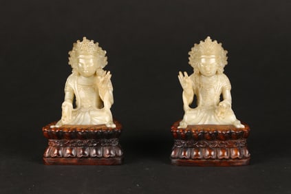 A Pair of Carved Jade Figures of Seated Bodhisattvas