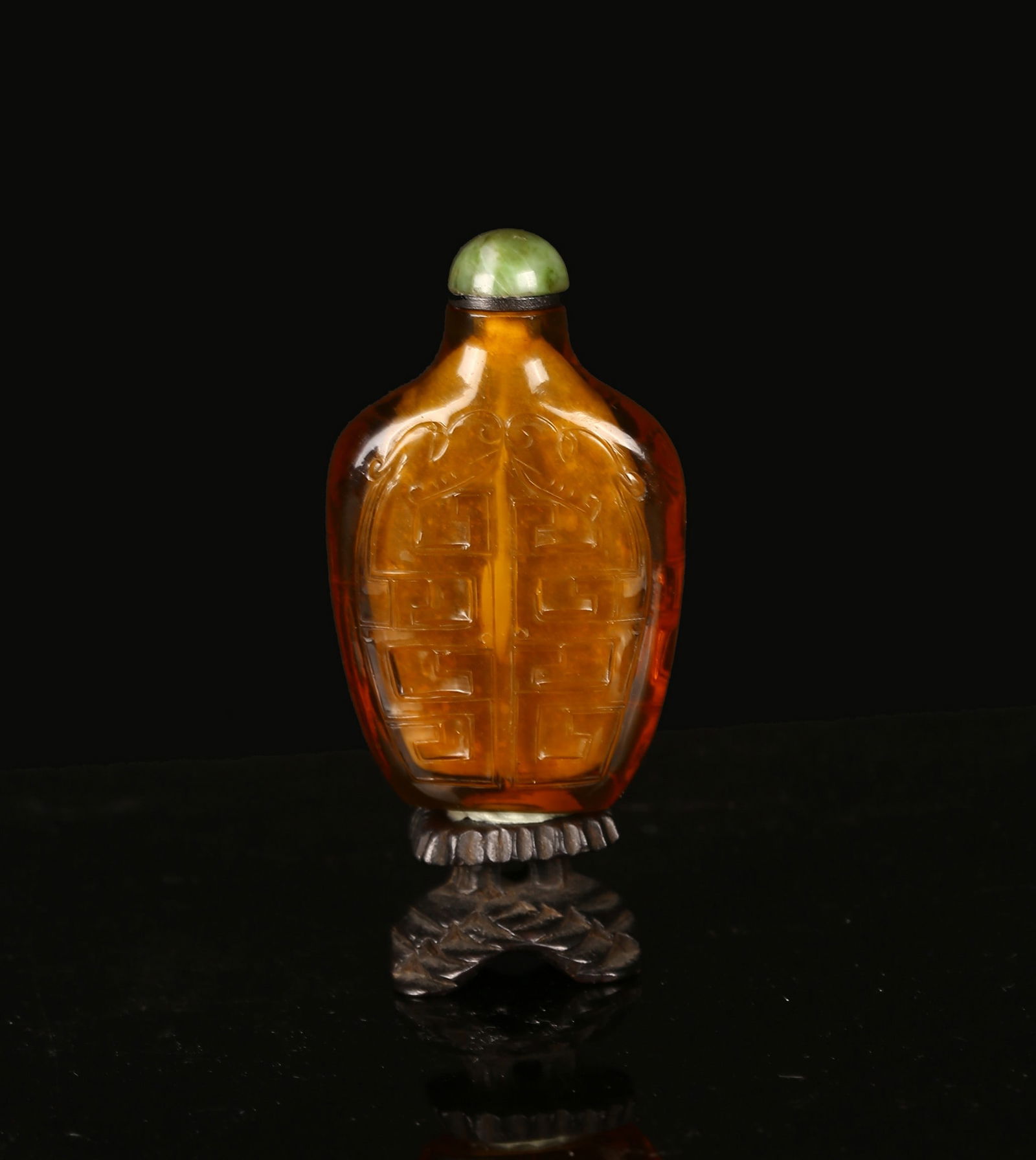 An Amber-Glass Snuff Bottle