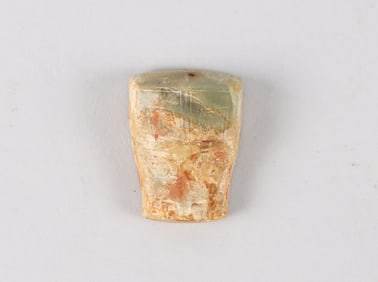 A Chinese Celadon Jade Mythical Beast Mask Ornament