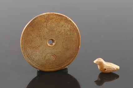 A Chinese Jade Disc and Jade Bird