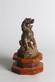 A Chinese Archaic Limestone Lion and Stand