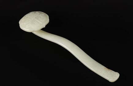 A Large White Jade 'Fish and Pendant' Ruyi Scepter