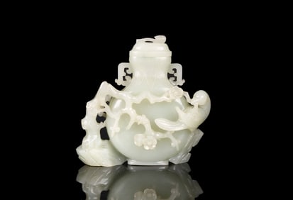 A White Jade 'Magpie and Prunus' Vase and Cover