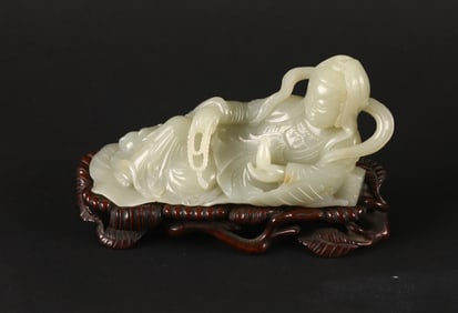 A White Jade Carving of Recumbent Guanyin