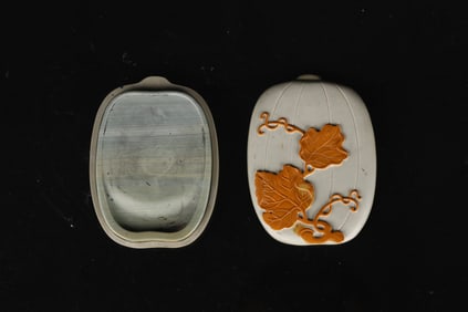 A Chinese Inscribed Songhua Inkstone and Cover
