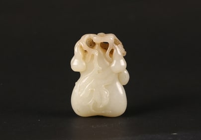 A Chinese white jade 'double gourds' pendant