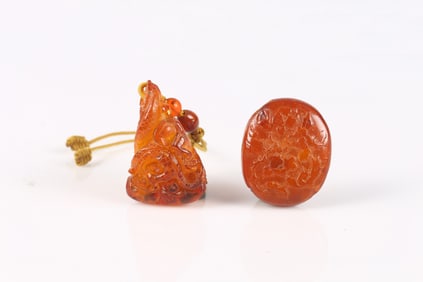 A Group of Two Amber Toggles