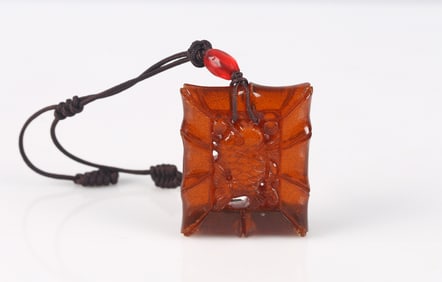 An Amber 'Fish' Square Pendant
