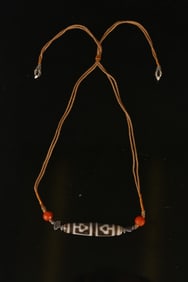 A Tibetan Dzi and Agate Bead Necklace