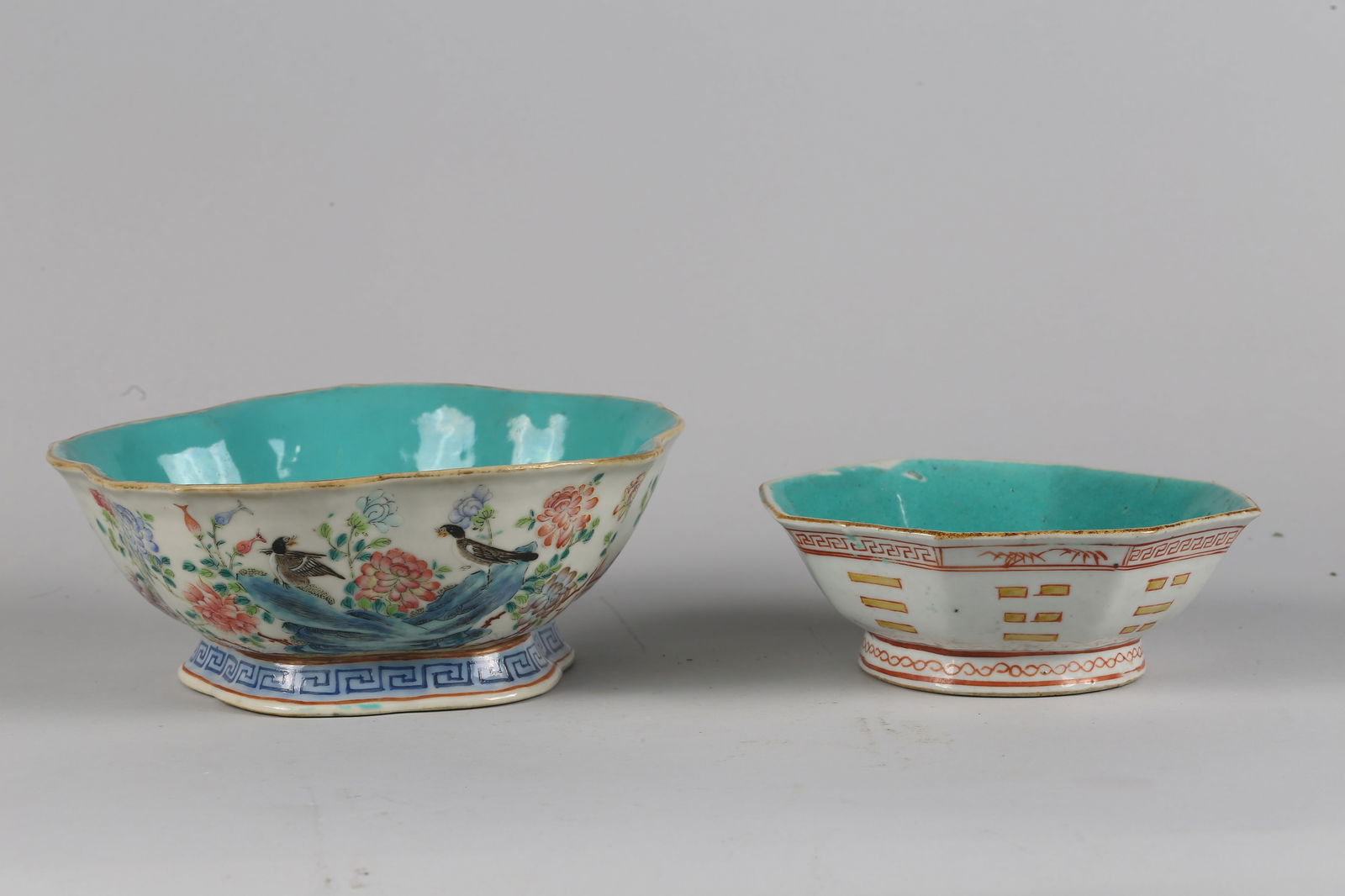 Two Chinese Famille Rose Bowls: Height: 3 1/4 in (8.3 cm) Diameter: 8 1/4 in (21.0 cm) 清同治 粉彩花盆一組兩件 One painted with birds perched amidst blossoming peonie