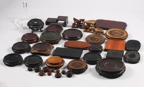 A Group of 37 Chinese Wooden Stands